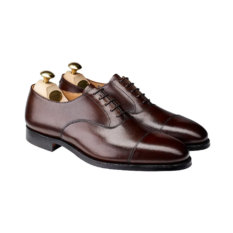 Brogue - perforated men's Oxfords for a traditional lookConnaught 2 Dark Brown Burnished Calf