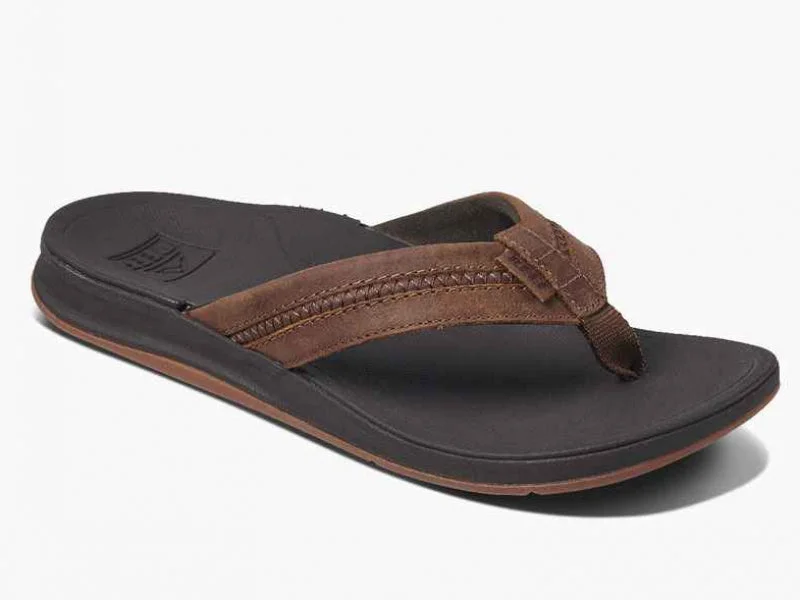 Men's sandals with a perforated leather upper for ventilationReef Leather Ortho Coast - Men's Sandal