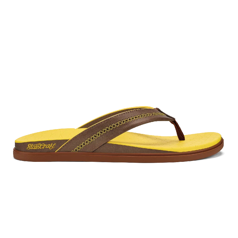 Men's sandals with a decorative buckle or charmShoreline  -  Brown Sugar / Yellow Hibiscus