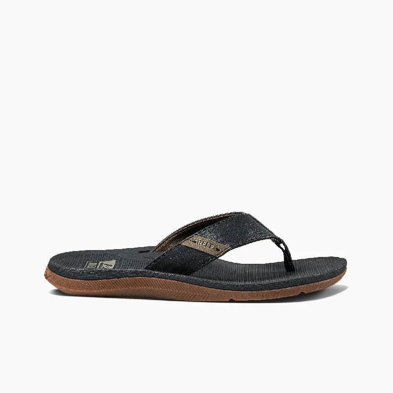 Men's sandals with a decorative buckle or charmReef Santa Ana